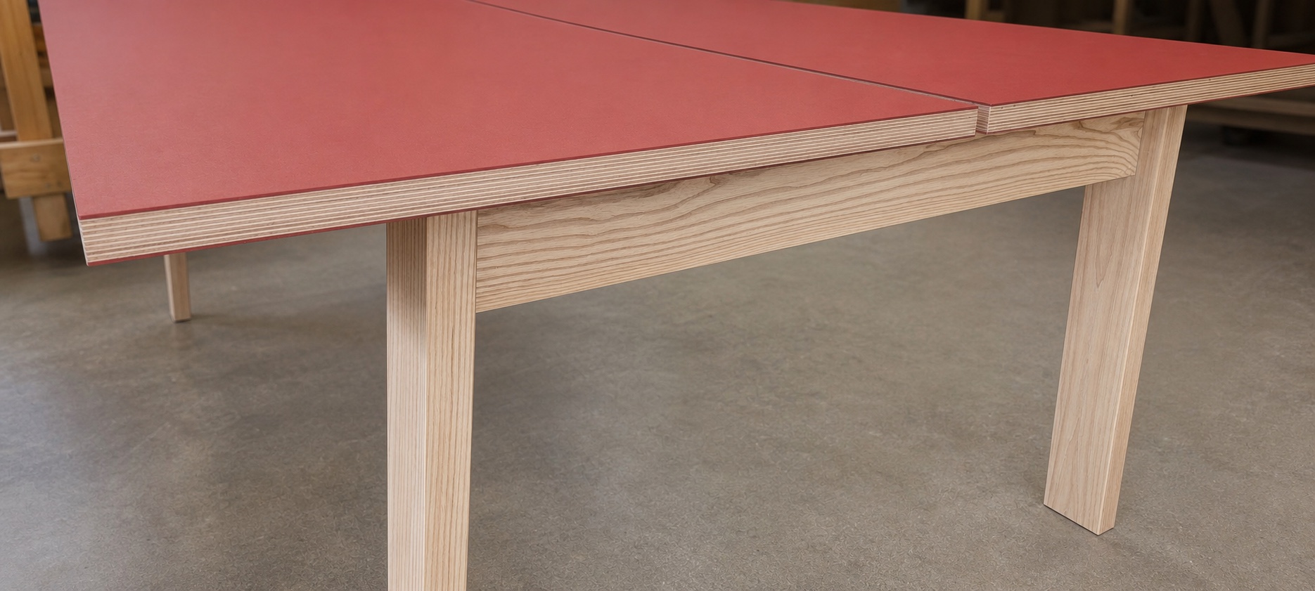 Red Marmoleum work surface edge and exposed wood frame detail
